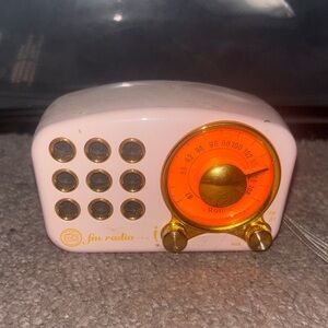 Retro Pink FM Radio with Gold Accents